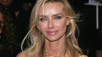 Dari Conrad, Hefner mendapatkan dua anak. Peter Kramer/Getty Images.