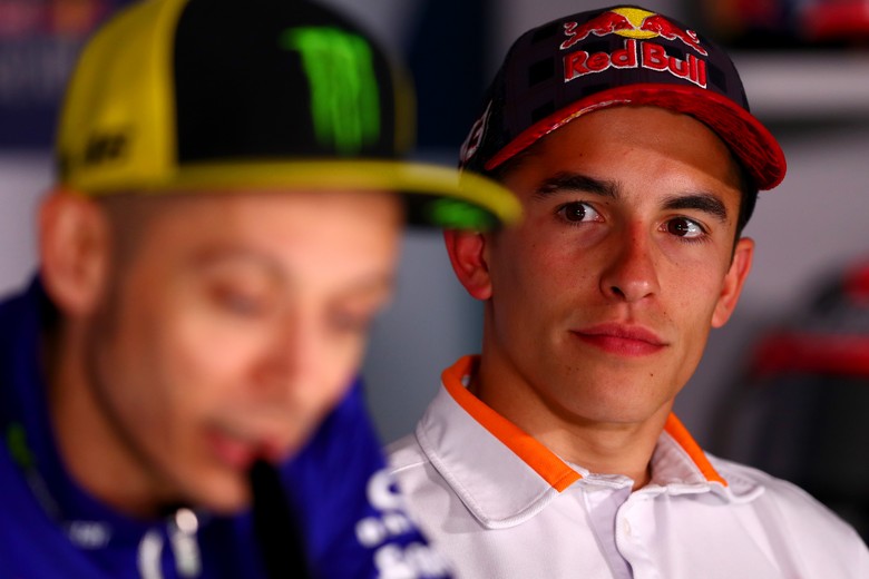 Marc Marquez JEREZ DE LA FRONTERA, SPAIN - MAY 04: Marc Marquez of Spain and the Repsol Honda Team watches Valentino Rossi of Italy and Movistar Yamaha MotoGP as he speaks at a press conference during previews to the MotoGP of Spain at Circuito de Jerez on May 4, 2017 in Jerez de la Frontera, Spain. (Photo by Dan Istitene/Getty Images)
