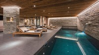 Chalet Sirocco di Verbier Switzerland ini terpilih sebagai Chalet Ski Terbaik di Dunia pada tahun 2015. POndok ski mewah ini menawarkan area kesehatan, kolam renang dengan air terjun, sauna, hamman, dan ruang pijat (Chalet Sirocco/CNN)