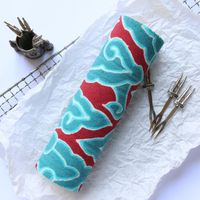 Cake roll motif batik mega mendung.