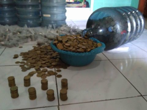 Nabung Uang Receh, Wanita Ini Bisa Punya Rp 60 Juta