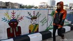 Ketika Pasukan Oranye Curhat Lewat Lukisan