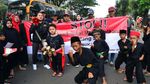 Aksi Pencak Silat Tolak Penyesatan Soal Informasi Susu