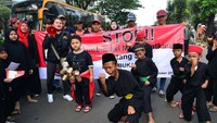 Acara tersebut dalam rangka memberikan sosialisasi dan kampanye stop informasi yang salah tentang susu berkadar gula tinggi di Senayan, Jakarta, Minggu (8/10/2017). Foto: dok. Dewan Kesehatan Rakyat