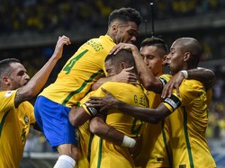 Brasil dipastikan lolos dengan status juara grup zona Amerika Selatan. Dengan performa menjanjikan, Neymar dkk. dibebani dengan target tinggi di Rusia, setelah gagal total di Piala Dunia 2014 yang digenar di negara sendiri. Foto: Pedro Vilela/Getty Images