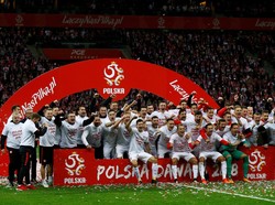 Polandia akan tampil di Piala Dunia pertamanya sejak 2006. Di masa lalu, Polandia pernah mencapai tempat ketiga dua kali pada penyelenggaran edisi 1974 dan 1982. Foto: Kacper Pempel/Reuters