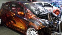 Kimbo mengalahkan sekitar 70 mobil peserta lainnya dalam kontes mobil berskala nasional itu.