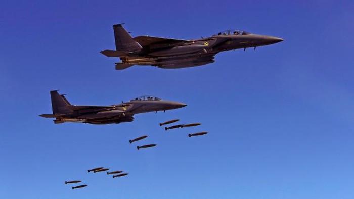 South Korean F-15K fighter jets dropping bombs at a shooting range in Gangwon Province, east of Seoul, during a joint military drill. Source: AFP