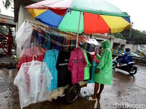 Tips Memilih Jas Hujan