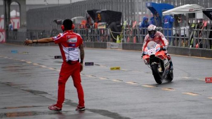 Andrea Dovizioso dalam sesi latihan MotoGP Jepang (Foto: TOSHIFUMI KITAMURA/AFP PHOTO) Andrea Dovizioso dalam sesi latihan MotoGP Jepang (Foto: TOSHIFUMI KITAMURA/AFP PHOTO)