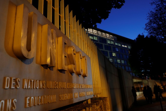 The logo of the United Nations Educational, Scientific and Cultural Organization (UNESCO) is seen in front of its headquarters in Paris, France, October 12, 2017.    REUTERS/Philippe Wojazer
