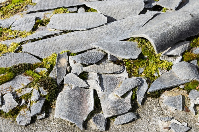 Damaged Asbestos roof table