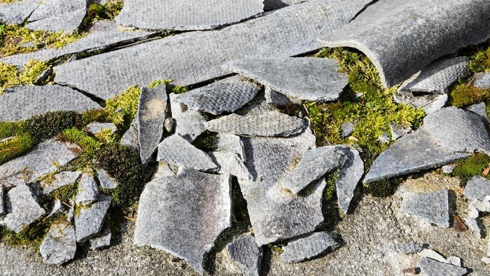 Damaged Asbestos roof table