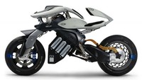 Robot yang secara otonom bisa mengendarai motor ini bisa menembus kecepatan 200 km per jam dan beradu dengan Valentino Rossi dalam mencetak waktu yang terbaik. Foto: Pool