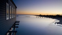 Busselton Jetty memanjang hingga 1.841 meter di atas permukaan Teluk Geographe (Thinkstock)