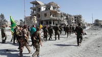 Berhasil direbutnya Raqqa dari ISIS menjadi simbol tegas runtuhnya pengaruh militan radikal itu di Suriah. Foto: REUTERS/Erik De Castro