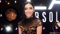 Namun tampak sedikit lubang di dress animal print yang dikenakannya. Pool/Noel/detikFoto.
