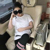 Givenchy Storm Rubber and Ribbed Knit Thigh Sock Boots, Rp 7 juta. Foto: Instagram