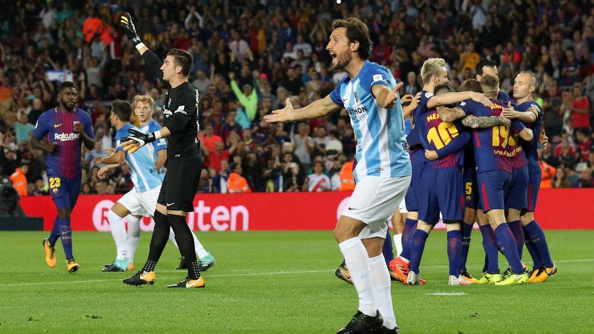 Aksi Barcelona di pekan kesembilan (Foto: Albert Gea/Reuters)