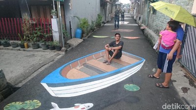 Foto: Saat Jalan Aspal di Depok Disulap Jadi Lukisan 3 Dimensi