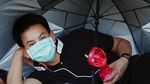 Foto: Warga Thailand Setia Menanti Kremasi Sang Raja