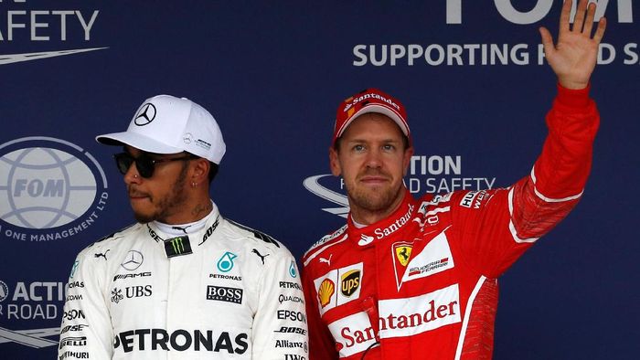 Lewis Hamilton dan Sebastian Vettel. (Foto: Toru Hanai/Reuters) Lewis Hamilton dan Sebastian Vettel. (Foto: Toru Hanai/Reuters)