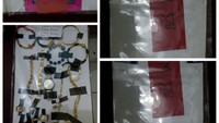 Ada pula enam buah cincin emas, satu anting, satu kalung plus liontin, tiga gelang rantai, lima gelang, satu jam tangan, satu ponsel Samsung, hingga tiga bungkus paket pakaian atas nama orang yang berbeda-beda. (Foto: Dok. Polres Purbalingga)