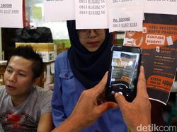 Penjual SIM Card Pajang Cara Registrasi Kartu Prabayar