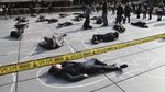 Orang-orang Berbaju Hitam Tergeletak di Pusat Kota Paris, Ada Apa?