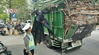 Tertibkan lalu lintas ,sat lantas Grobogan datangkan superhero, tulis Satlantas Grobogan di Instagram