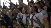 Lebih dari 676 orang berkumpul untuk memecahkan rekor dunia sebagai fans terbanyak yang tampil mengenakan kostum penyihir dalam film yang diangkat dari novel karya J. K. Rowling tersebut. Daniel Becerril/REUTERS.