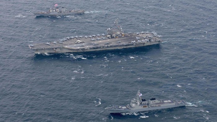 The Navys forward-deployed aircraft carrier USS Ronald Reagan and the forward-deployed Arleigh Burke-class destroyer USS Stethem steam alongside ships from the Republic of Korea Navy in the waters east of the Korean Peninsula on OctoBer 18, 2017. Picture taken on October 18, 2017.   Courtesy Kenneth Abbate/U.S. Navy/Handout via REUTERS    ATTENTION EDITORS - THIS IMAGE HAS BEEN SUPPLIED BY A THIRD PARTY.