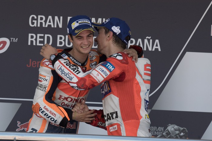 JEREZ DE LA FRONTERA, SPAIN - MAY 07:  Dani Pedrosa of Spain and Repsol Honda Team celebrate with Jorge Lorenzo of Spain and Ducati Team  (R) on the podium at the end of the MotoGP race during the MotoGp of Spain - Race at Circuito de Jerez on May 7, 2017 in Jerez de la Frontera, Spain.  (Photo by Mirco Lazzari gp/Getty Images)