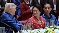 Trump dan Iriana terlihat tengah membicarakan sesuatu. Foto: Twitter Kemensetneg