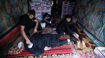 Foto: Melihat Ritual Cambuk Diri di Irak
