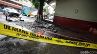 Lokasi penemuan mayat sudah dipasangi garis polisi.