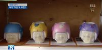 Ibu-ibu Korea Pakaikan Helm pada Bayi Agar Bentuk Wajah Anak Lebih Cantik