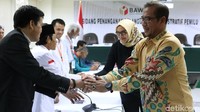 Dua anggota KPU yang hadir yakni Hasyim Asyari dan Evi Novida Ginting Manik.