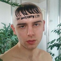 Rambut berbentuk kepalan tangan yang menyatu dengan motif di kemeja. Foto: Istimewa