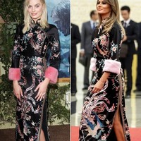 Margot Robbie memakai gaun Gucci yang terinspirasi budaya China ini di premier film Tarzan tahun 2016. Gaun yang sama dipakai Melania Trump ketika berkunjung ke Beijing, China pekan lalu. Foto: Ist.