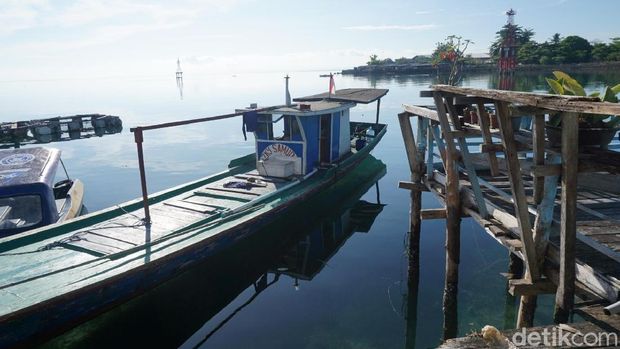 Naik kapal milik warga (Wahyu/detikTravel)