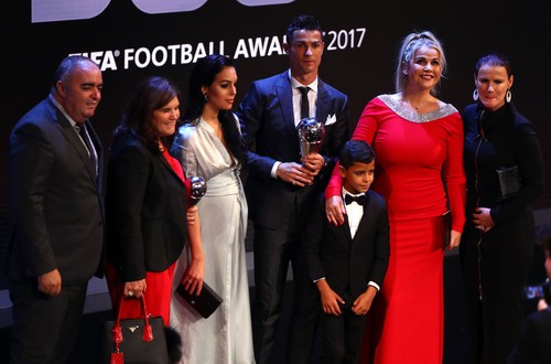 LONDON, ENGLAND - OCTOBER 23:  Cristiano Ronaldo of Portugal and Real Madrid CF wins The best Fifa men's player and celebrates on stage with Georgina Rodriguez and  Cristiano Ronaldo Junior during The Best FIFA Football Awards Show on October 23, 2017 in London, England.  (Photo by Michael Steele/Getty Images)