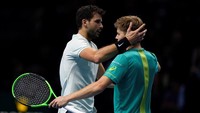Dimitrov sukses menjuarai ATP Finals setelah mengalahkan Goffin dengan skor 7-5, 4-6, 6-3. Tony OBrien/Reuters.