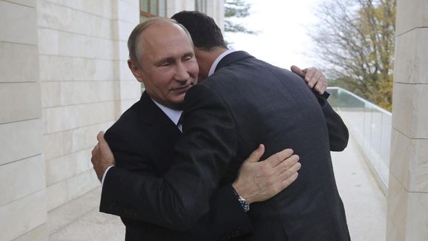 Pelukan hangat Putin untuk Assad saat keduanya bertemu pada 20 November kemarin