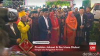 Jokowi dan Iriana tiba di gelanggang di lokasi acara, Bukit Hijau Regency Taman Setia Budi (BHR Tasbi), Kota Medan, Sumatera Utara, Sabtu (25/11/2017) pukul 09.30 WIB. Mereka langsung diulosi. (Foto: Dok. CNN Indonesia TV)