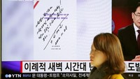 Tertulis dalam kertas yang ditandatangani Kim Jong Un, seperti dilansir dari Reuters Tembakan yang berani untuk partai dan tanah air! (Foto: Dok. REUTERS/Kim Hong-Ji)