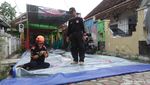 Foto: Melihat Longsor di Bantaran Kali Code Yogyakarta