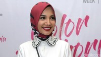 Senyumnya kala berpose di depan kamera. Pool/Noel/detikFoto.
