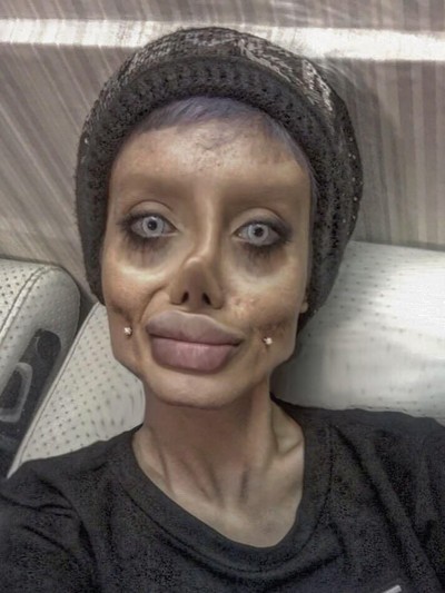 Setelah dibebaskan dari penjara, zombie Angelina Jolie mengungkapkan wajah aslinya untuk pertama kalinya