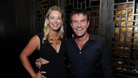 Coco Vandeweghe (kiri) bersama Pat Cash saat menghadiri Citi Taste Of Tennis bersama Coco Vandeweghe and friends di Restoran Hakkasan pada Agustus 2017.  (Craig Barritt/Getty Images for AYS World)